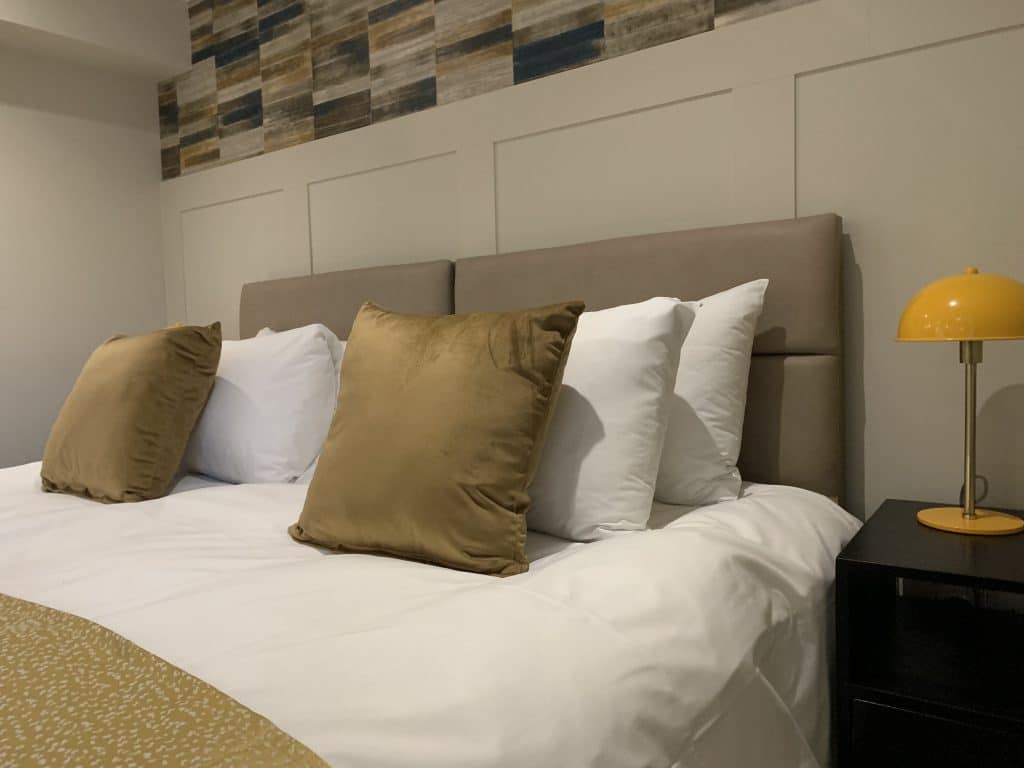 The Gresham Aparthotel Bed