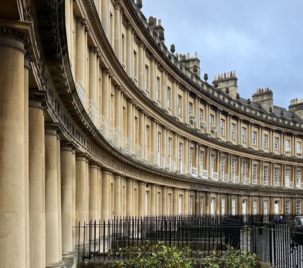 The Circus, Bath. A side view of the tall townhouses with black wrought iron gates in a row on The Circus, Bath