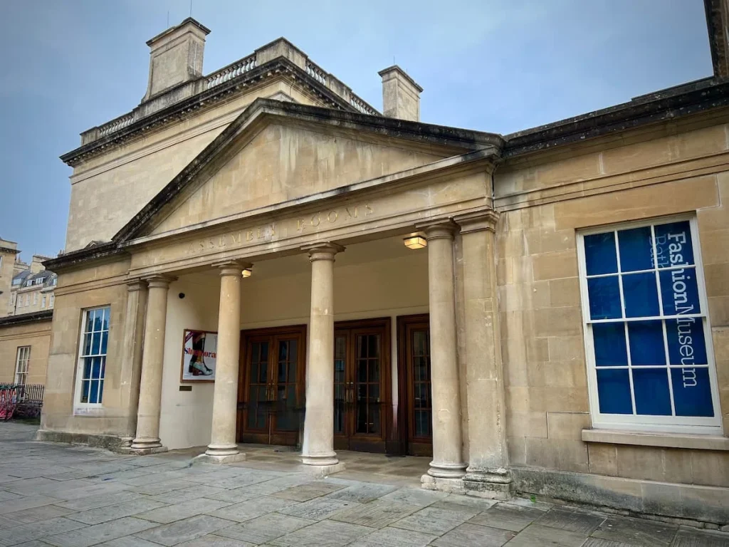 The Assembly Rooms Exterior in Bath with Regency pillars and beige stone.