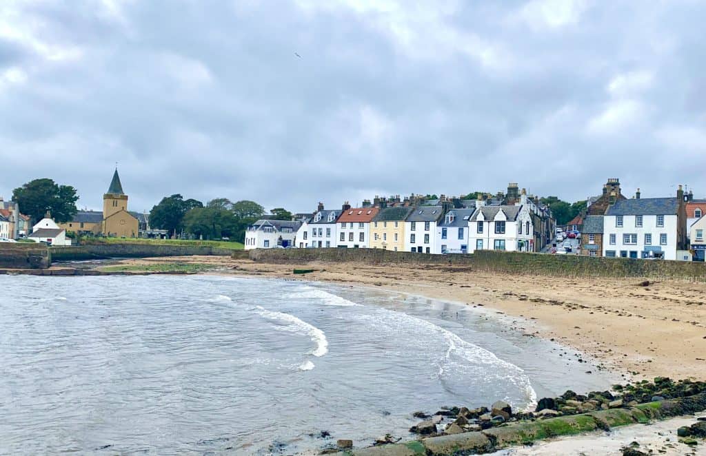 Villages and towns in Fife: Anstruther Harbour, Fife lined with a church and houses