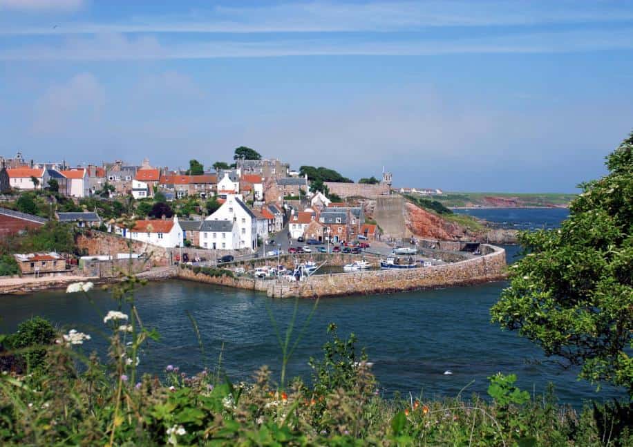 Villages and towns in Fife: Crail harbour, Fife with a picturesque view of the village buildings