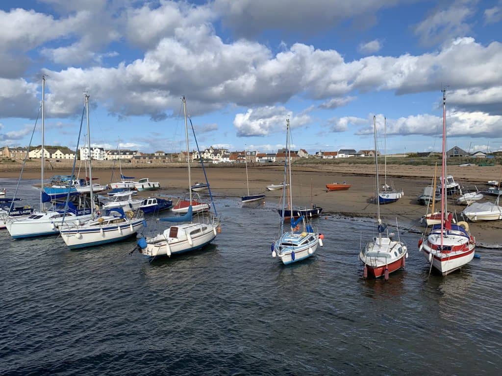 Villages and towns in Fife: Elie Harbour boats with the village in the background