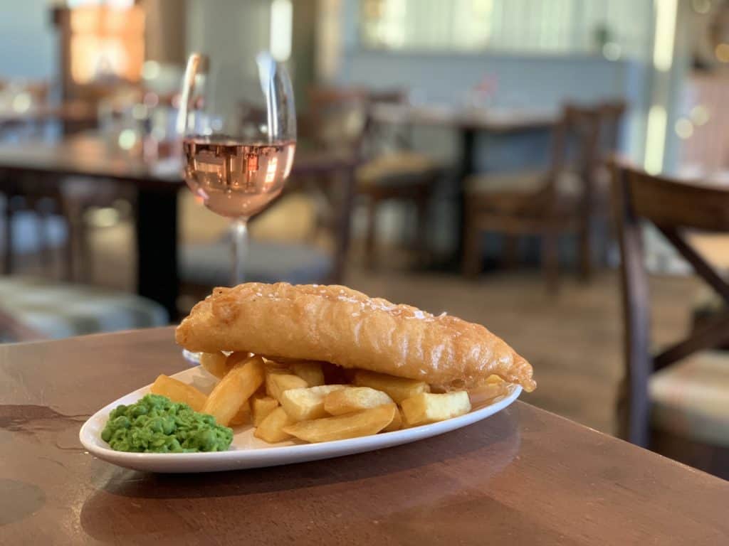 Villages and towns in Fife:The Ship Inn, Fish & Chips with a glass of rose on the table