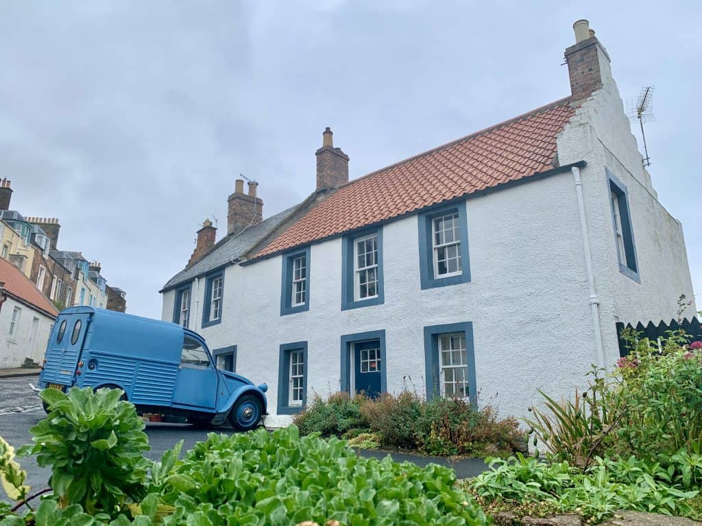 Villages and towns in Fife: St Monans Village, Fife house with a blue van in the entrance 