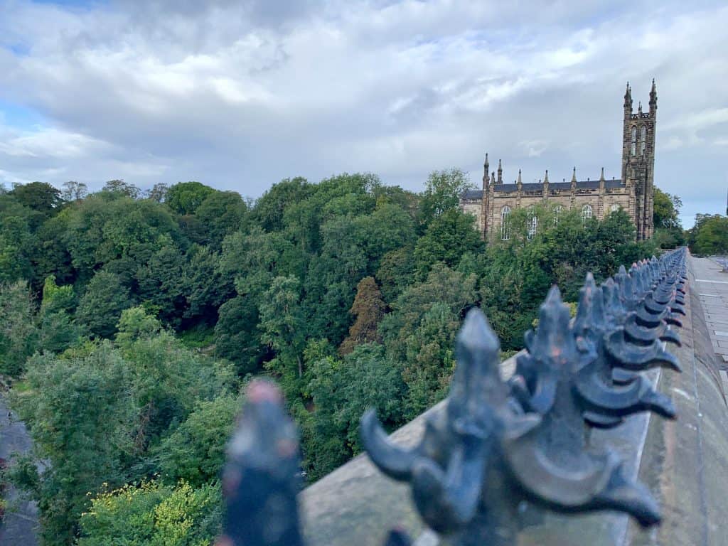 Photo locations in Edinburgh: a church with bridge railings in Dean village
