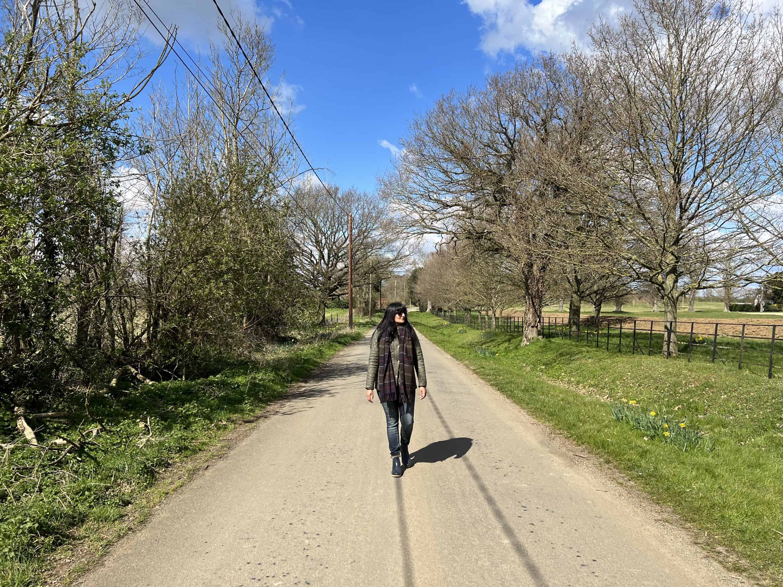 Bejal walking down country lane
