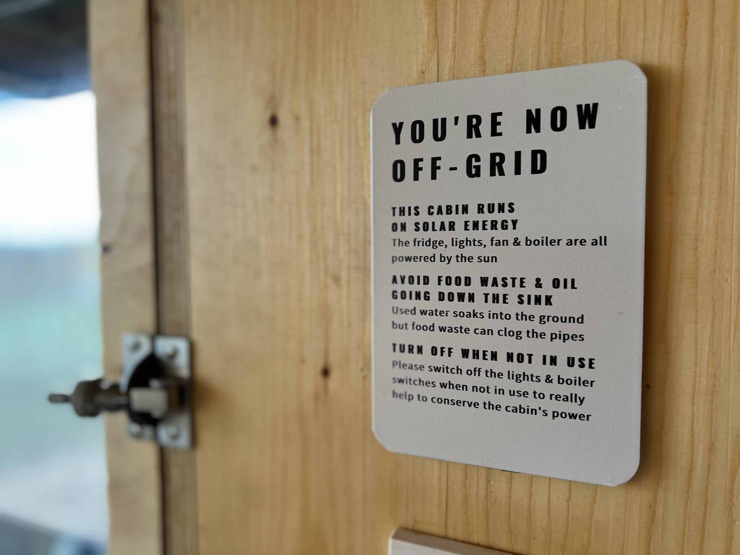 Pablo cabin off-grid sign