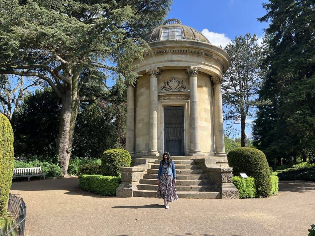 Victoria Park in Leamington Spa, Warwickshire with Bejal walking down the stairs of the historical rotunda monument.