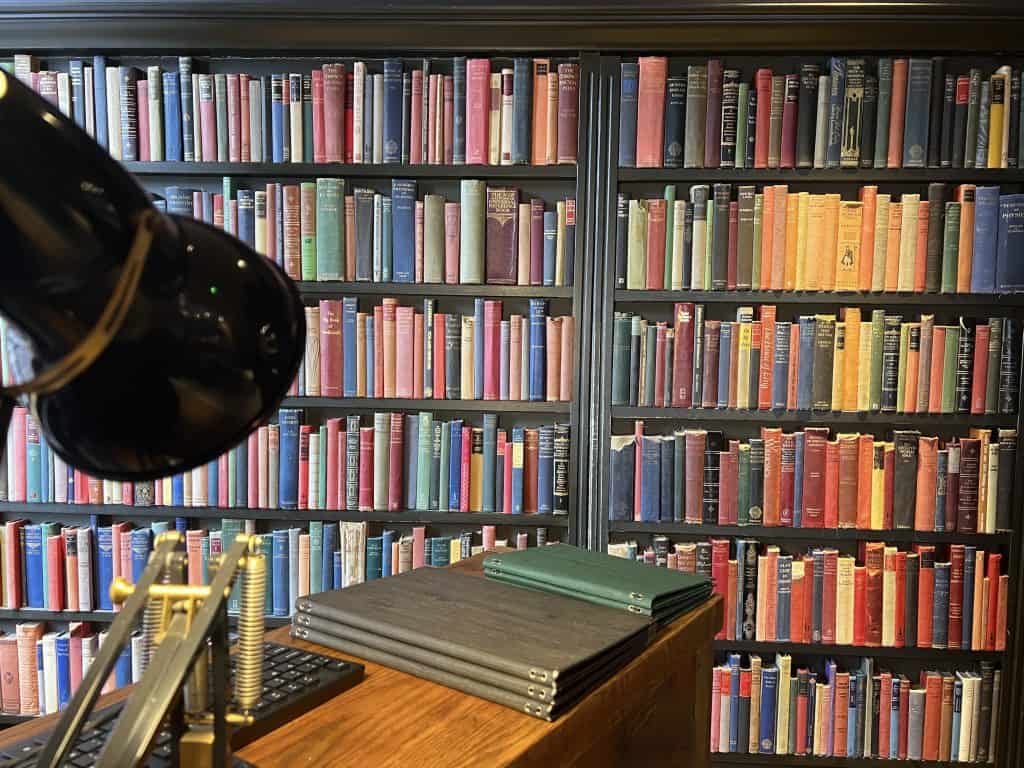 Afternoon Tea at Knight & Garter: Restaurant entry bookcase lined door