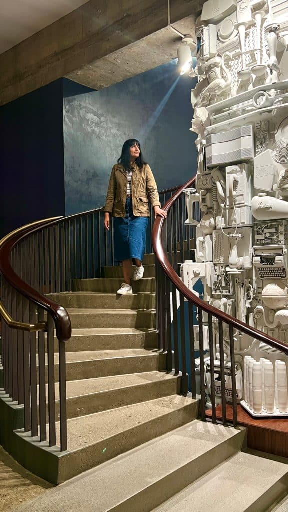 Cool and quirky hotels in Boston, Bejal walking down industrial stairs