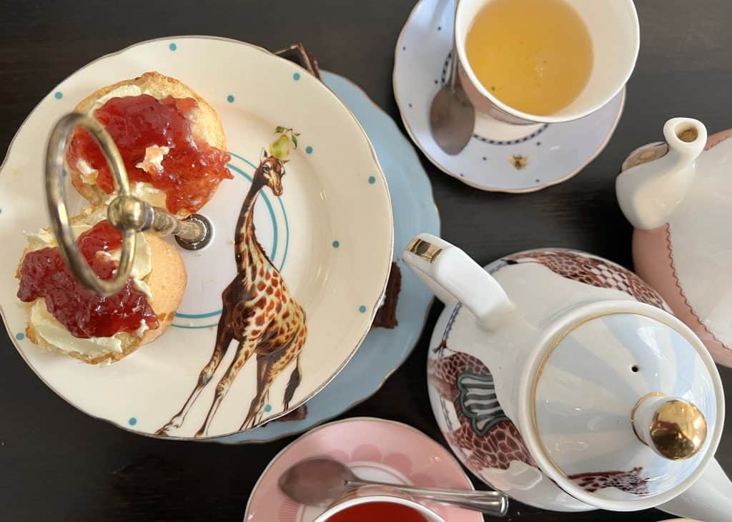 Top Lay of scones, clotted creama dn jam