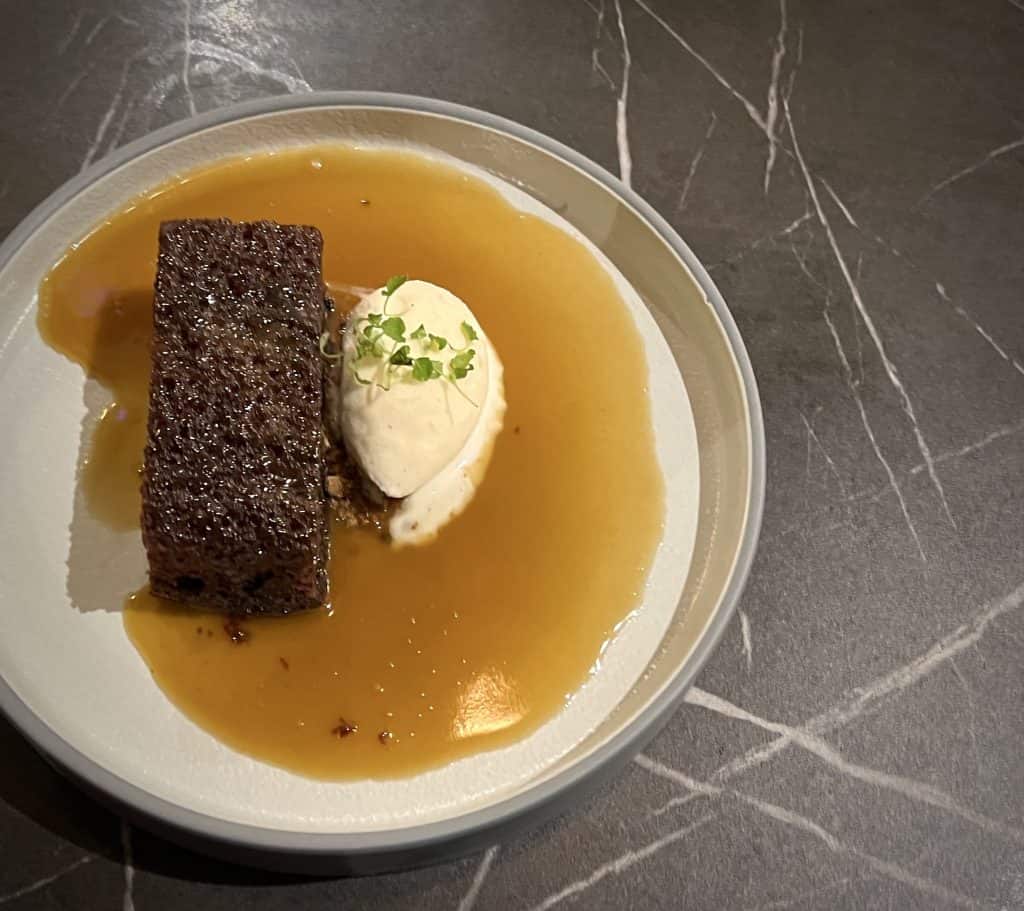 Blossoms Restaurant dessert: Sticky Toffee Pudding with Ice-cream