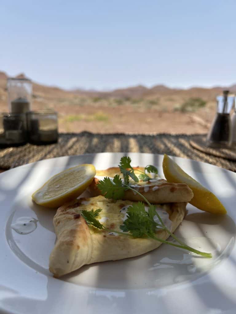 Damaraland Camp Turkish bread with cheese with a view