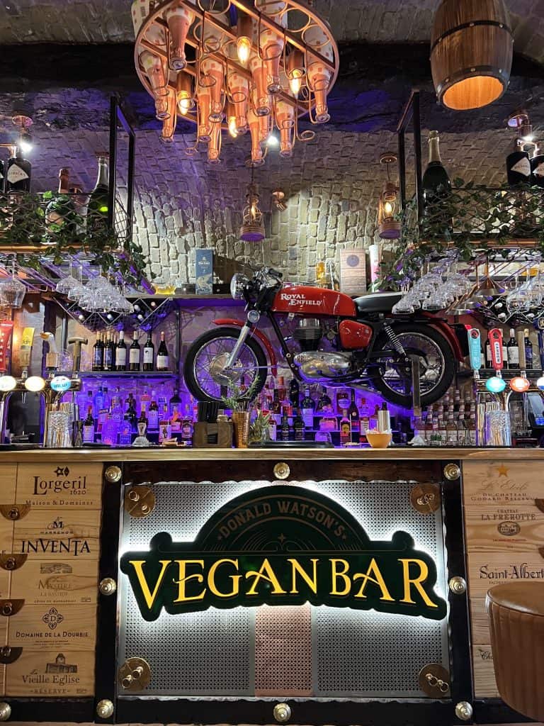 Vegan Bar area with Royal Enfield Motorcyle Vegan Bar area with Royal Enfield Motorcyle