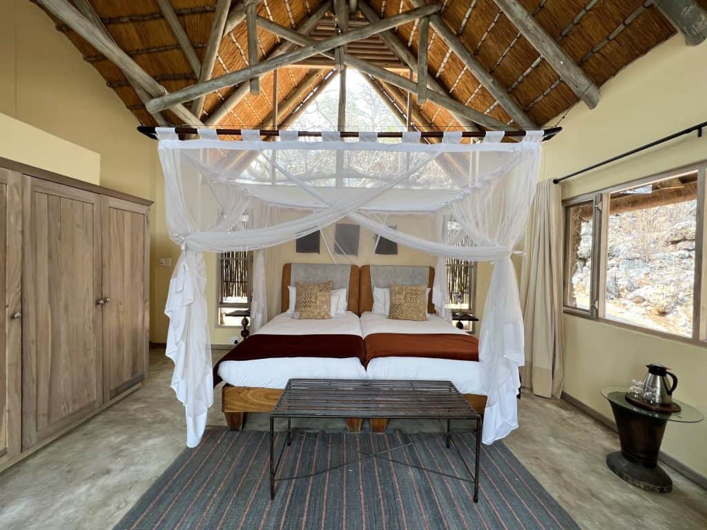 Eco-friendly Lodges in Namibia: Ongava Lodge bed in luxury villa