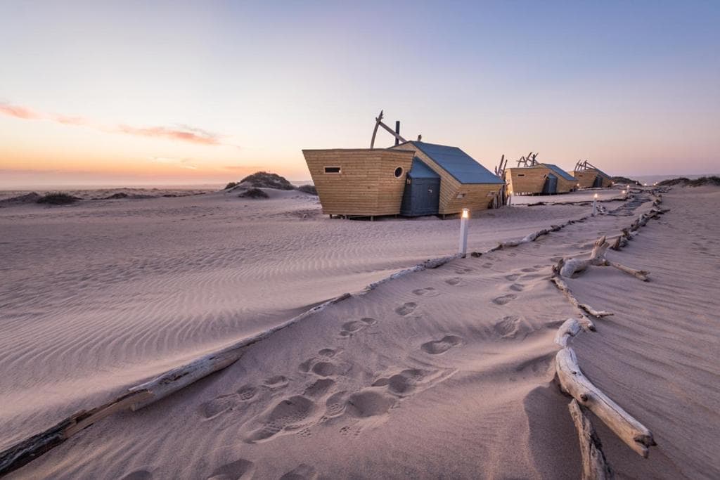 Eco-friendly Lodges in Namibia: Shipwreck Lodge exterior and landscape