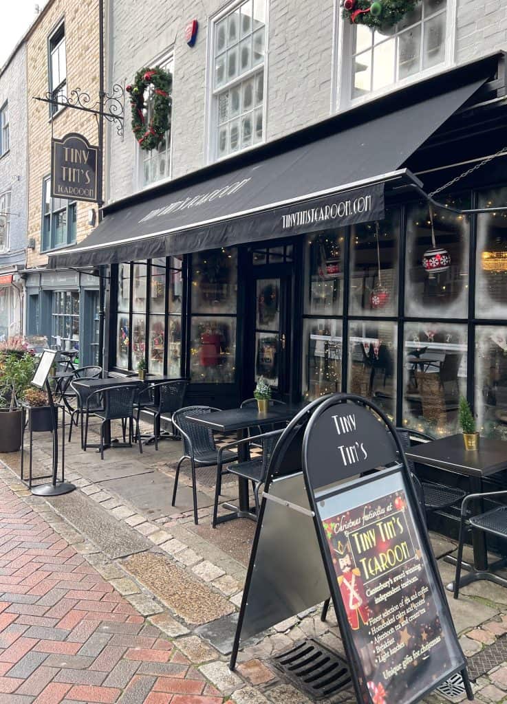 The best of Canterbury, Tiny Tims Tearooms from outside with tables and signage in the winter time
