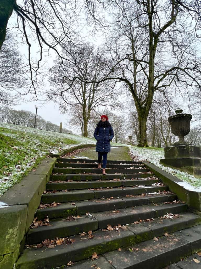Bejal walking down stair on the Crescent in Buxton