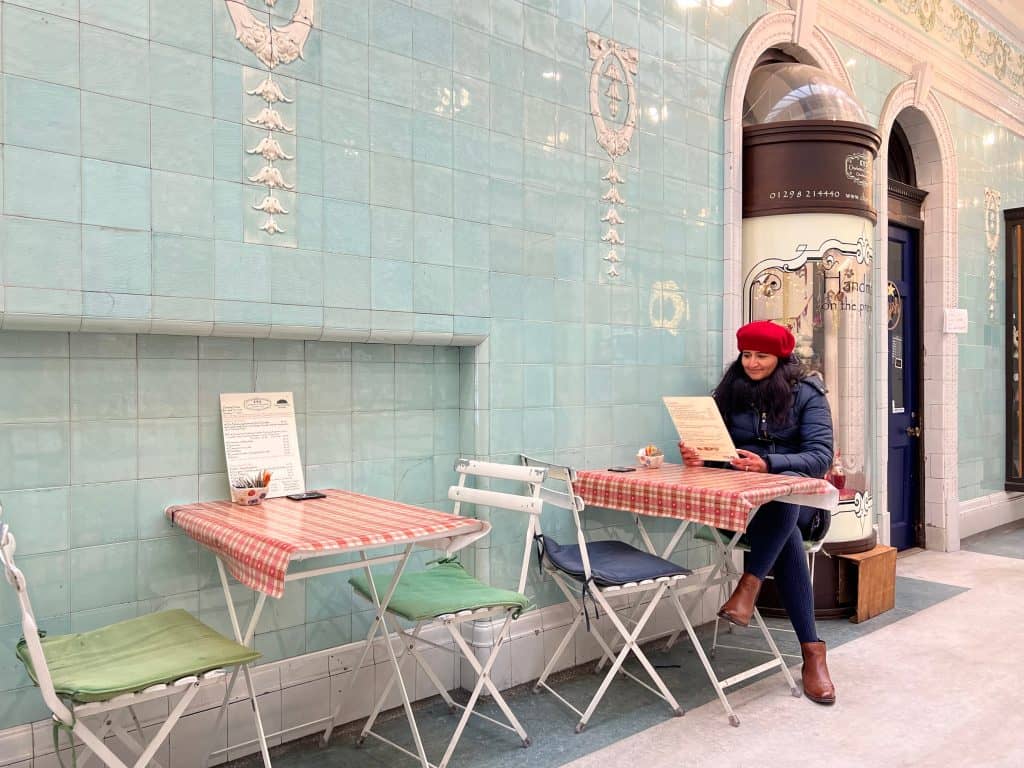 Weekend in Buxton: Cavendish Arcade interiors with bejal sitting at Charlotte's Chocolatier and cafe