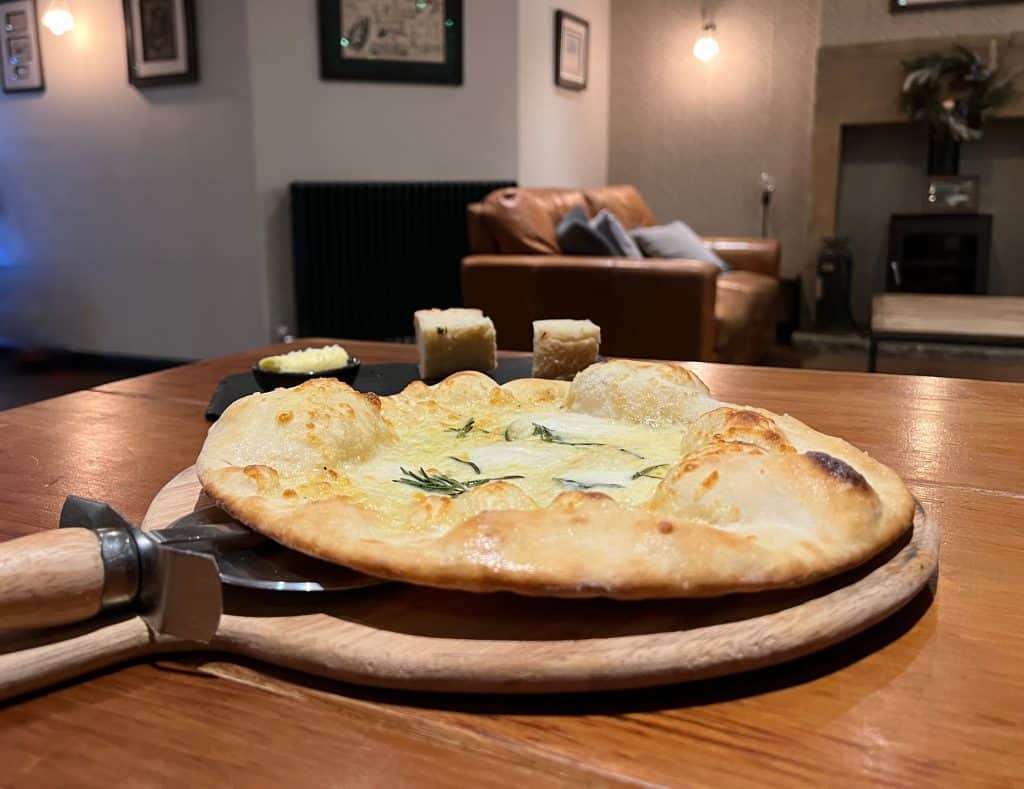 Garlic bread with mozzarella as sharing platter during a stay at The Merchant's Yard.