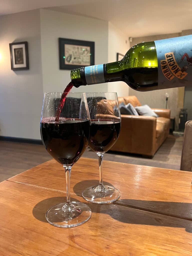 Red wine being poured during a stay at The Merchant's Yard, Tideswell