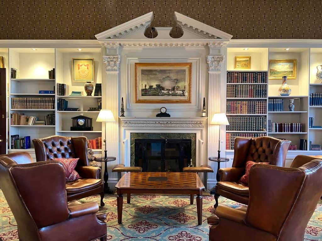 Fireplace in Library Bar with armchairs surrounding