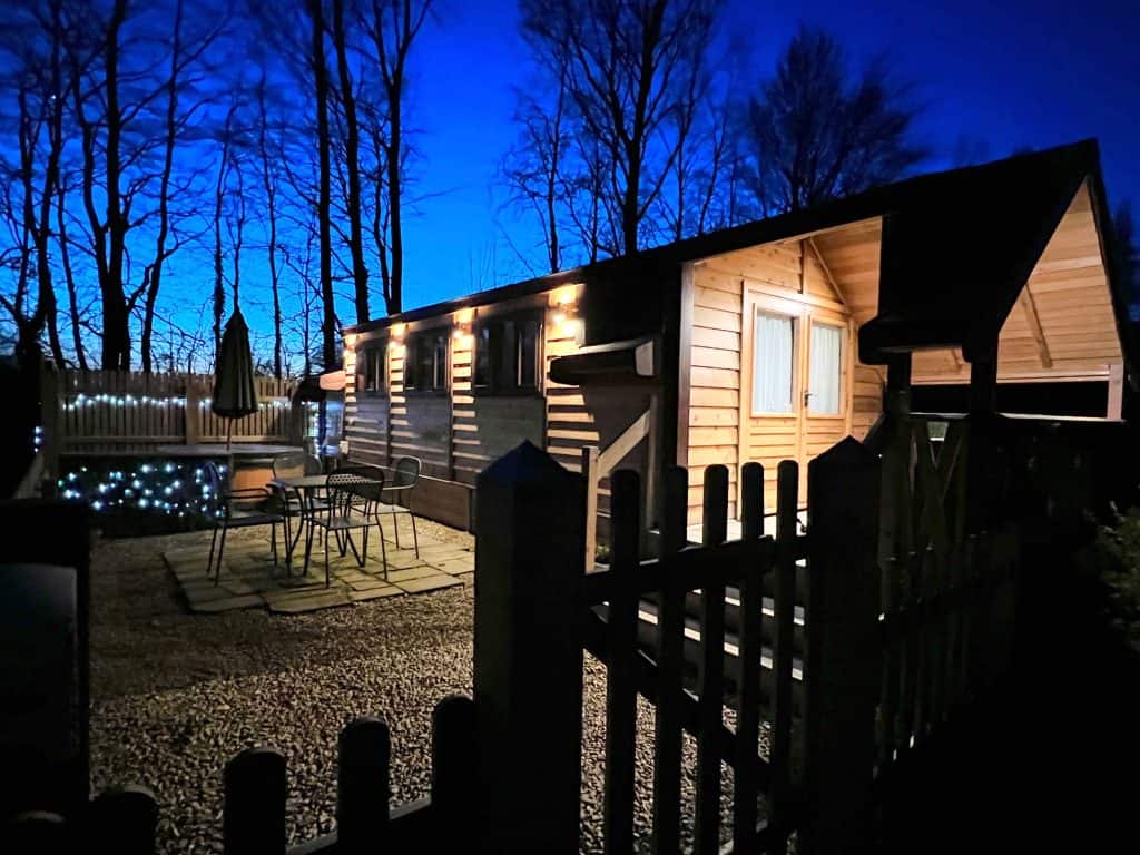 Squirrel cabin at night with fairy lights