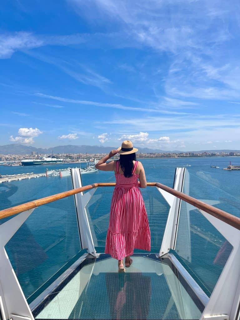 Bejal on glass bottom floor at Solarium, front of Symphony of the Seas