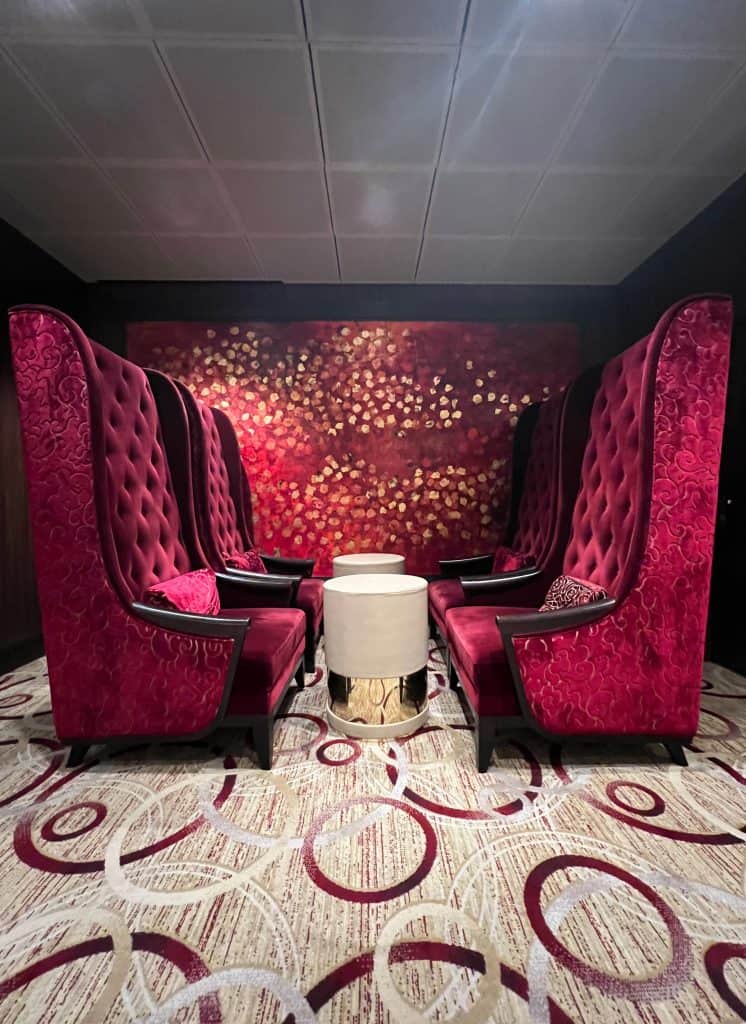 First-time cruise guide: Main dining room red tall back chairs