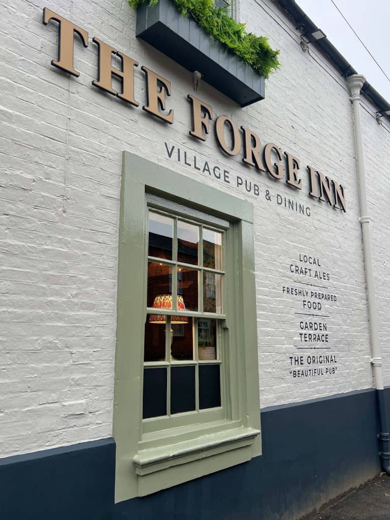 Forge Inn Window exterior with writing