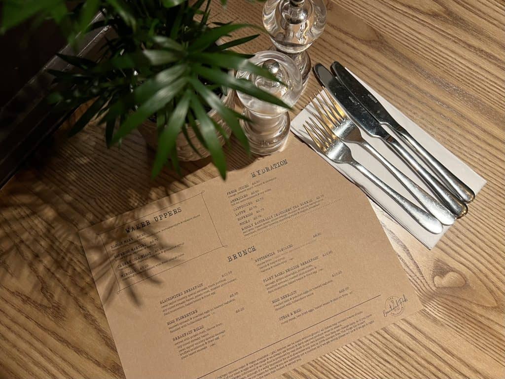 Brunch at The Forge Inn: Menu with plant