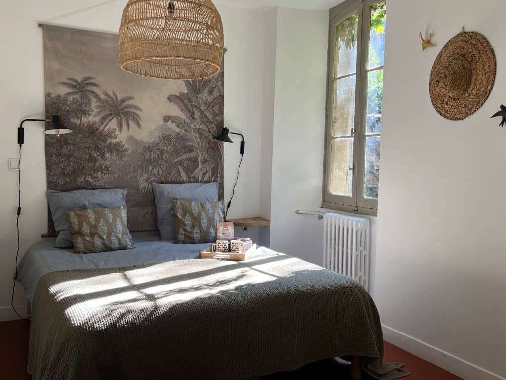 Historic Places to Stay in Avignon: tray with drinks on Le Lieu bed