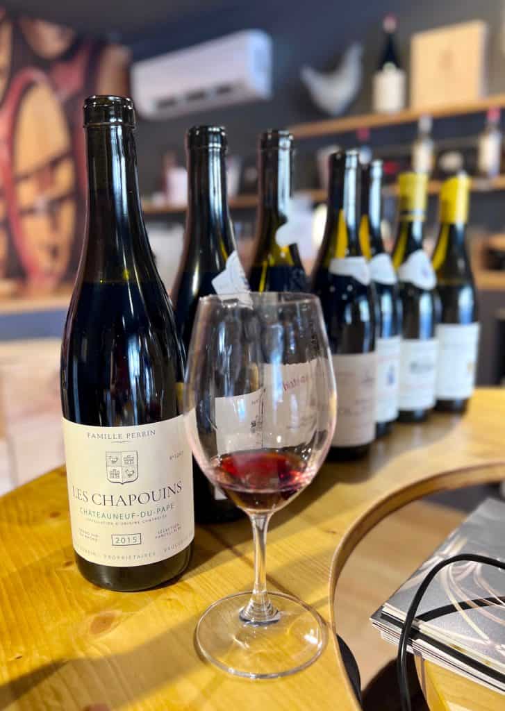 Wineries in Châteauneuf-du-Pape:Red wine and bottles of wines to taste at domaine de beaucastel celler