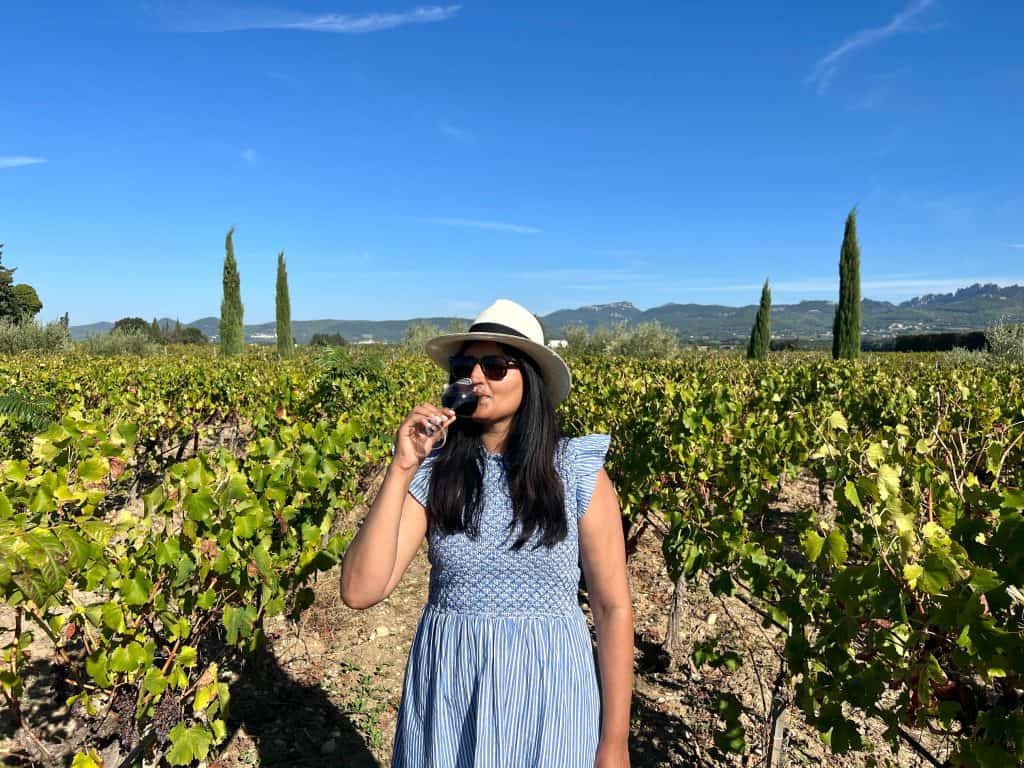 Bejal drinking wine at domaine de l'odylee vineyards