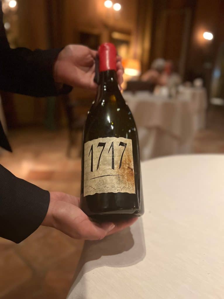 Vegetarian-Friendly Michelin-Starred Dining At La Mirande: Wine Bottle