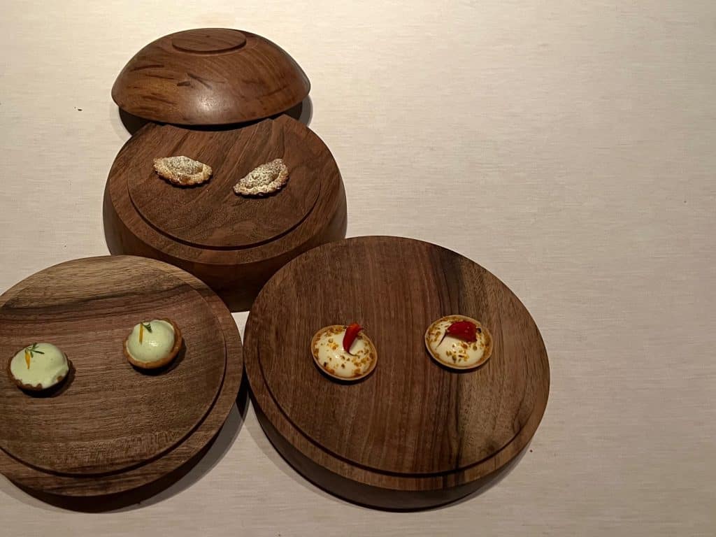 Vegetarian-friendly Michelin starred dining at La Mirande final course, Empanada Miel E pollen - Alice GALYSorbet - Tagète