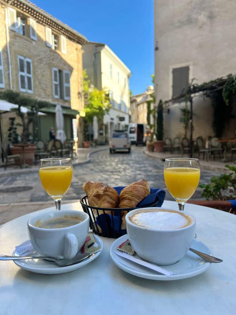 Lourmarin - cafe Gaby with croissants, coffees and orange juice.