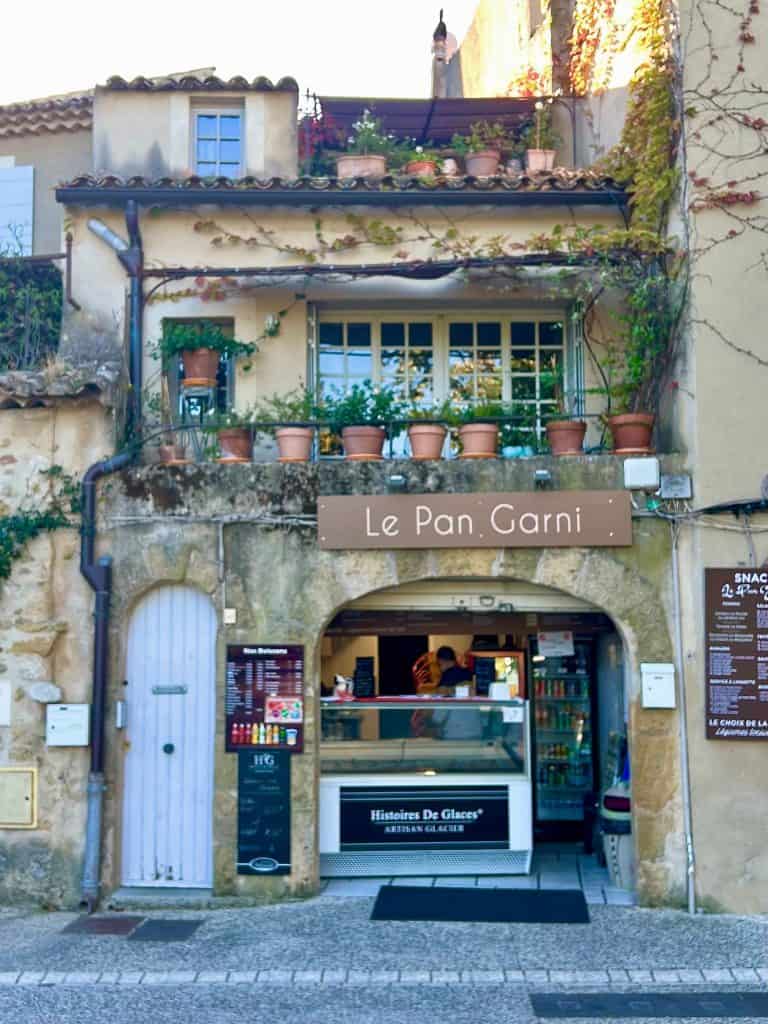 Beautiful villages to visit in Provence: Lourmarin deli exterior