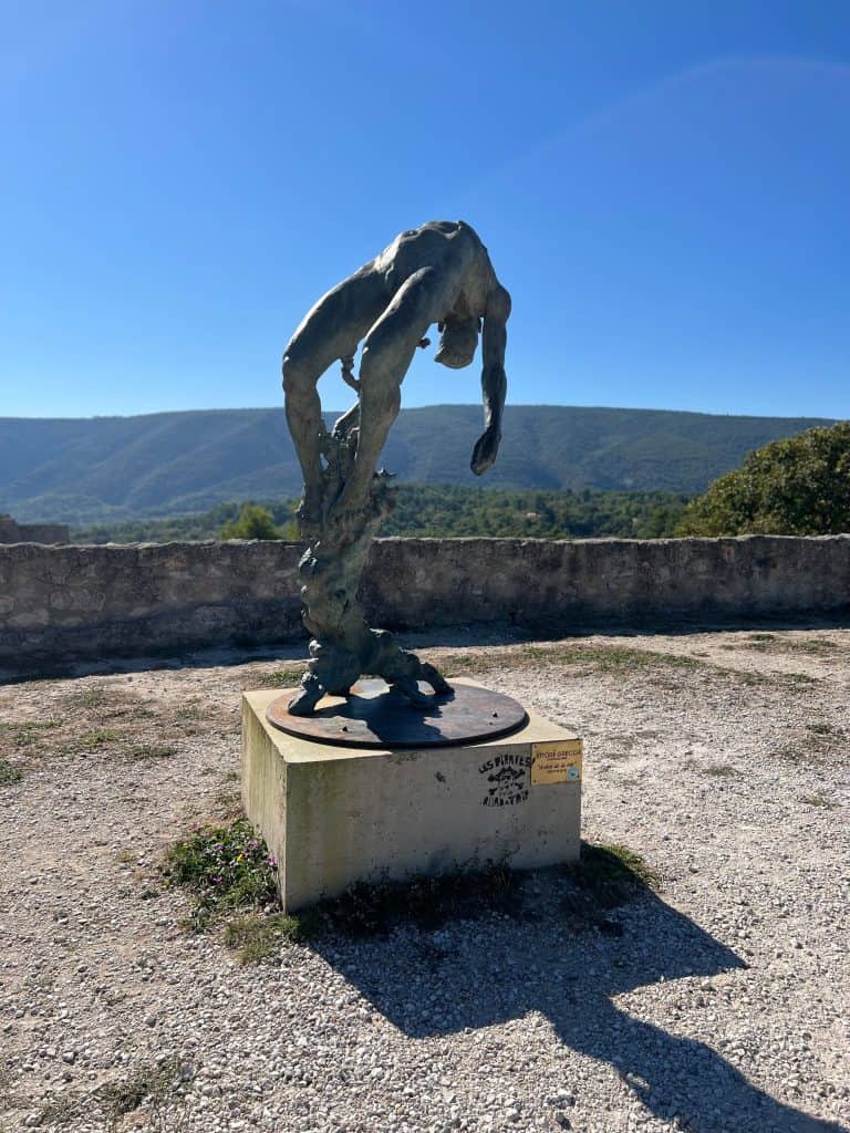Contemporary statue outside Lacoste Chateau