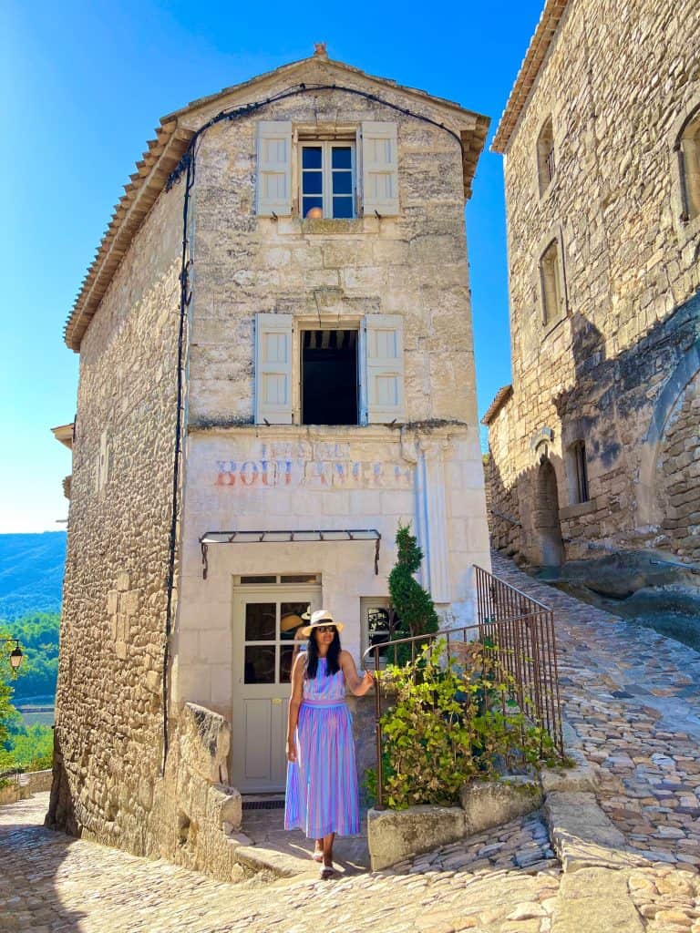 Bejal standing outside old Boulangerie in Lacoste