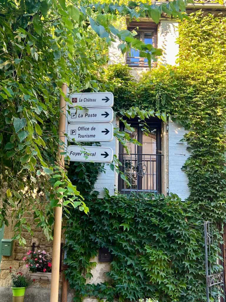 Beautiful villages to visit in Provence: Road signs post in Lourmarin