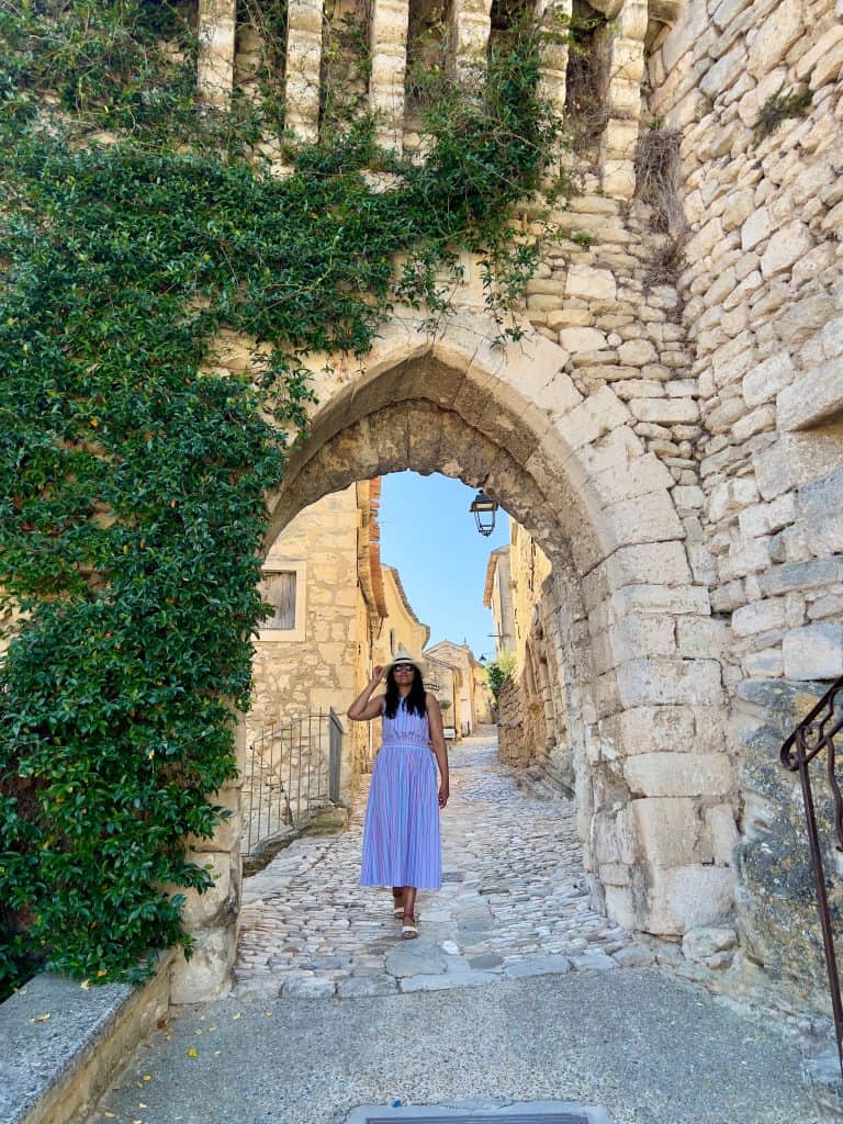 Bejal standing in medieval archway in Lacoste