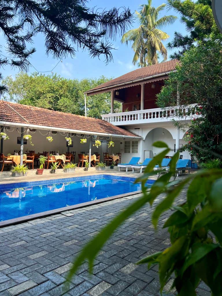 Pool are with Mill restaurant in background at Abad Dutch Bungalow