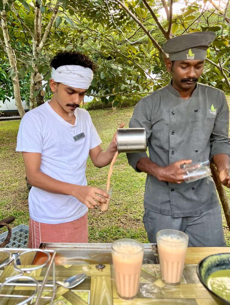 Tea-makers preparing the afternoon tea stall at The Green Leaf