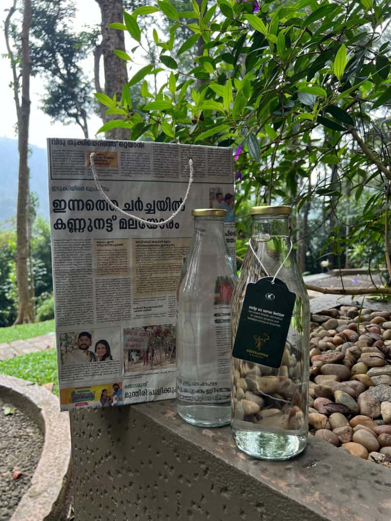 Reusable newspaper bag and glass water bottles at Greenwoods Resort, Thekkady