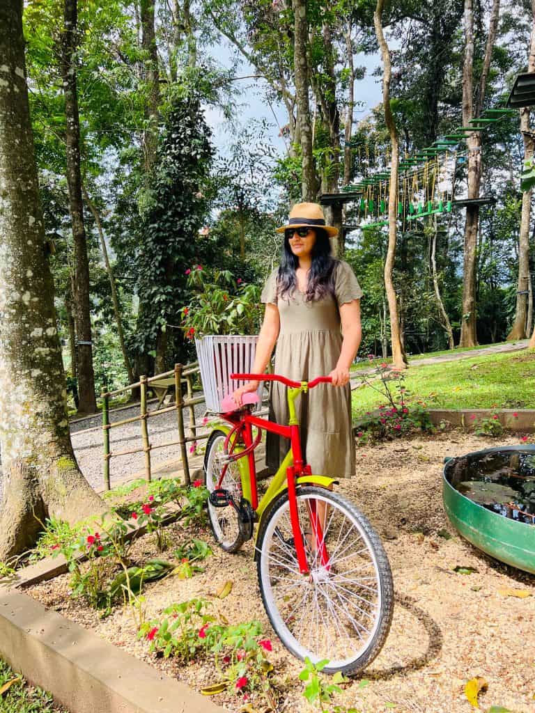Bejal with red bike in Thekkady