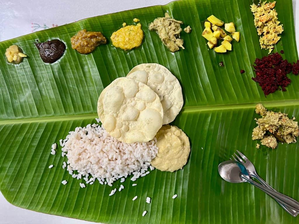 Traditional Keralan Onam food on a banana leaf