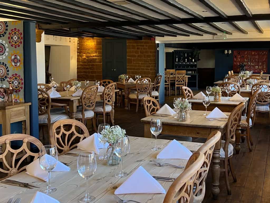 Beautiful Indian Food: The Marquess of Exeter: tables and chairs in restaurant space