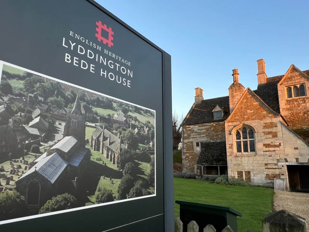 English Heritage board with Bede House in the background