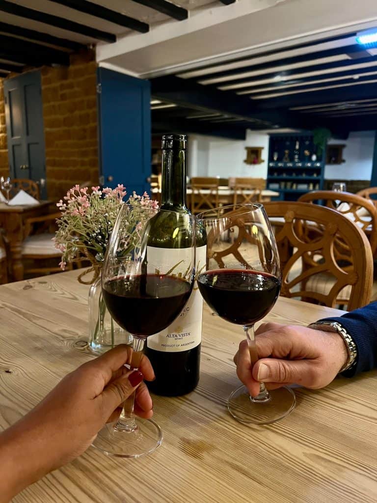 Beautiful Indian Food: The Marquess of Exeter: 2 glasses of red wine tapping